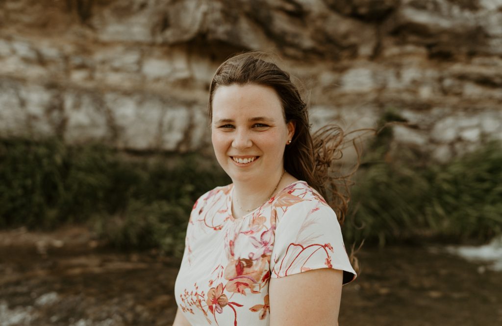 girl standing by cliff