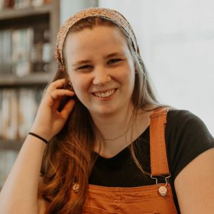 girl wearing overalls