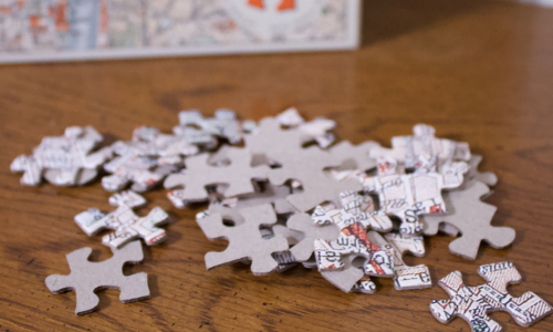 puzzle pieces and puzzle for a january gift